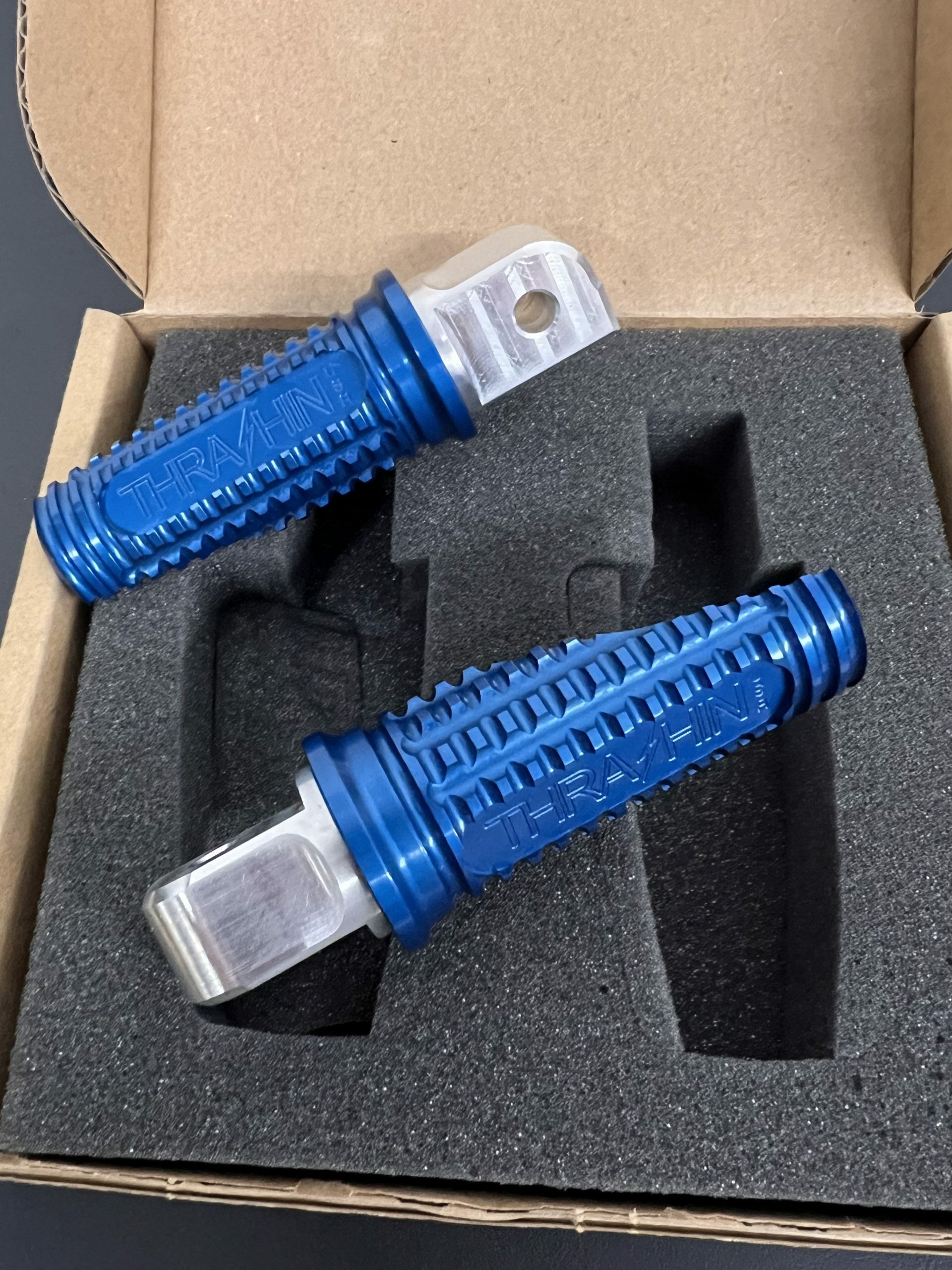 Thrashin Supply Burnout Footpegs for M8 Softail Passenger in Blue