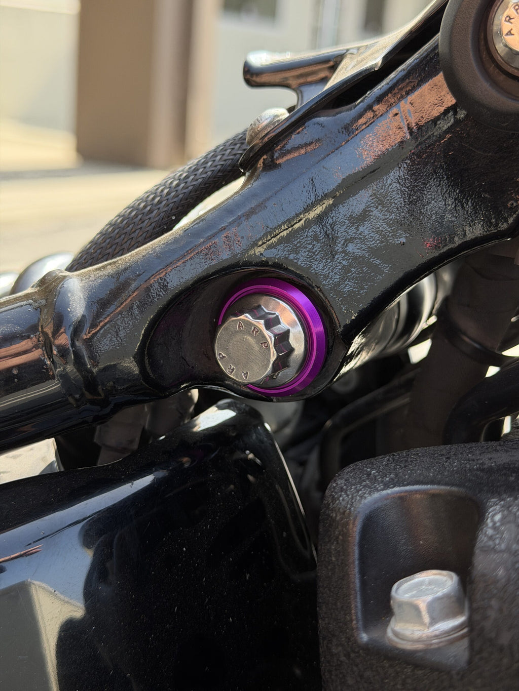 ARP upper shock bolt with spacer washer and billet aluminum accent washer