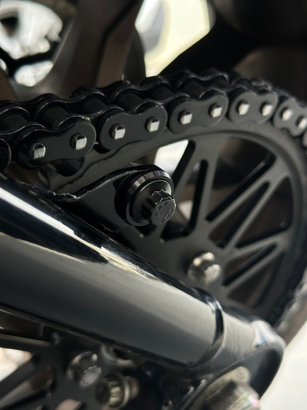 Black Oxide ARP 12-point belt guard delete hardware for M8 Softail