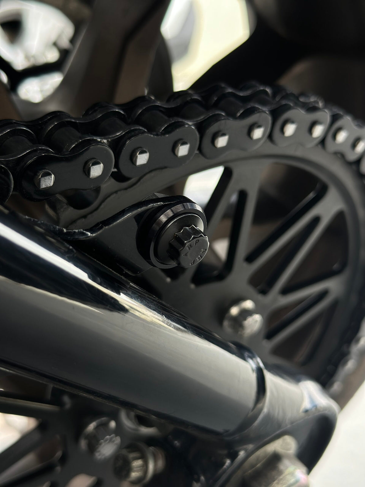 Black Oxide ARP 12-point belt guard delete hardware for M8 Softail
