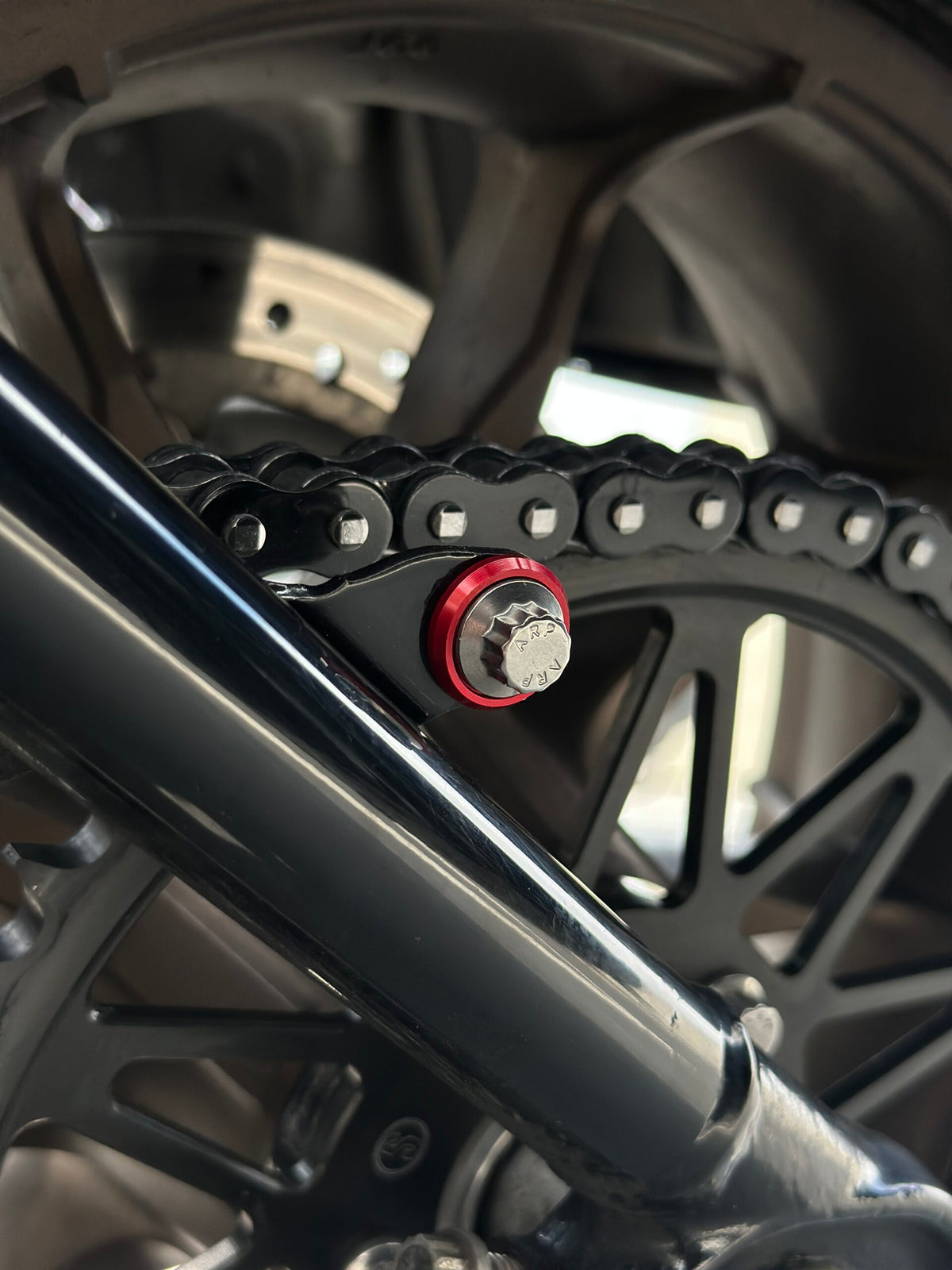ARP hardware installed at compatible M8 Softail belt guard mounting points