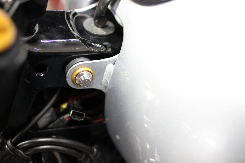 ARP gas tank mounting hardware installed on compatible Harley M8 Softail