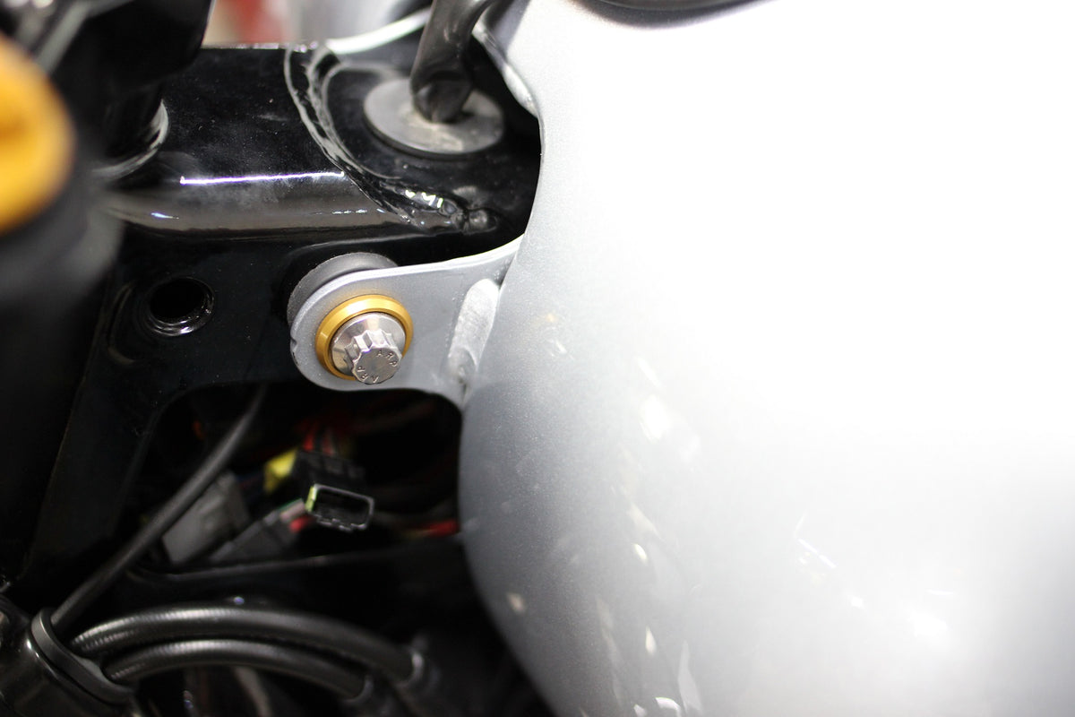 ARP gas tank mounting hardware installed on compatible Harley M8 Softail