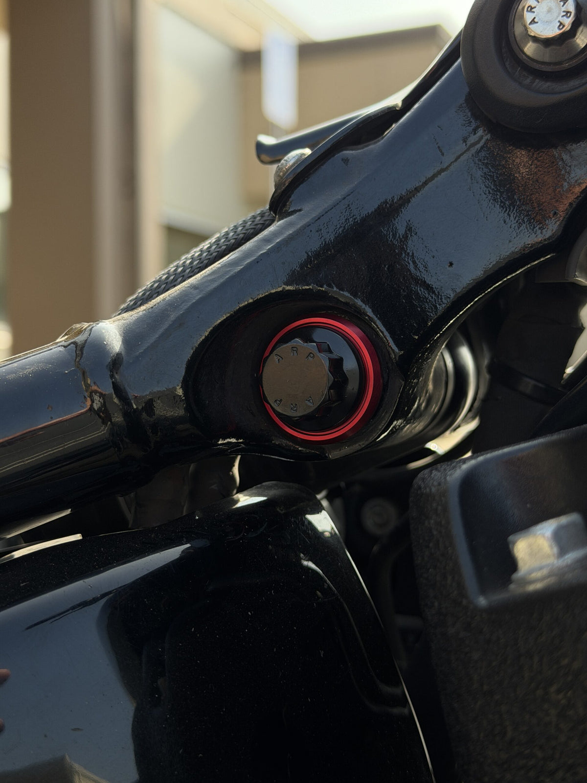ARP upper shock bolt with spacer washer and billet aluminum accent washer
