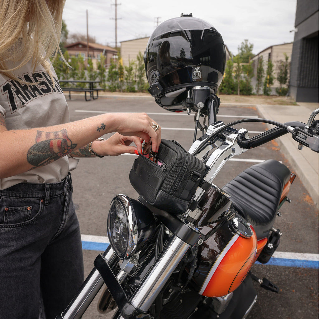 Thrashin Supply crossbody handlebar bag mounted on Harley risers