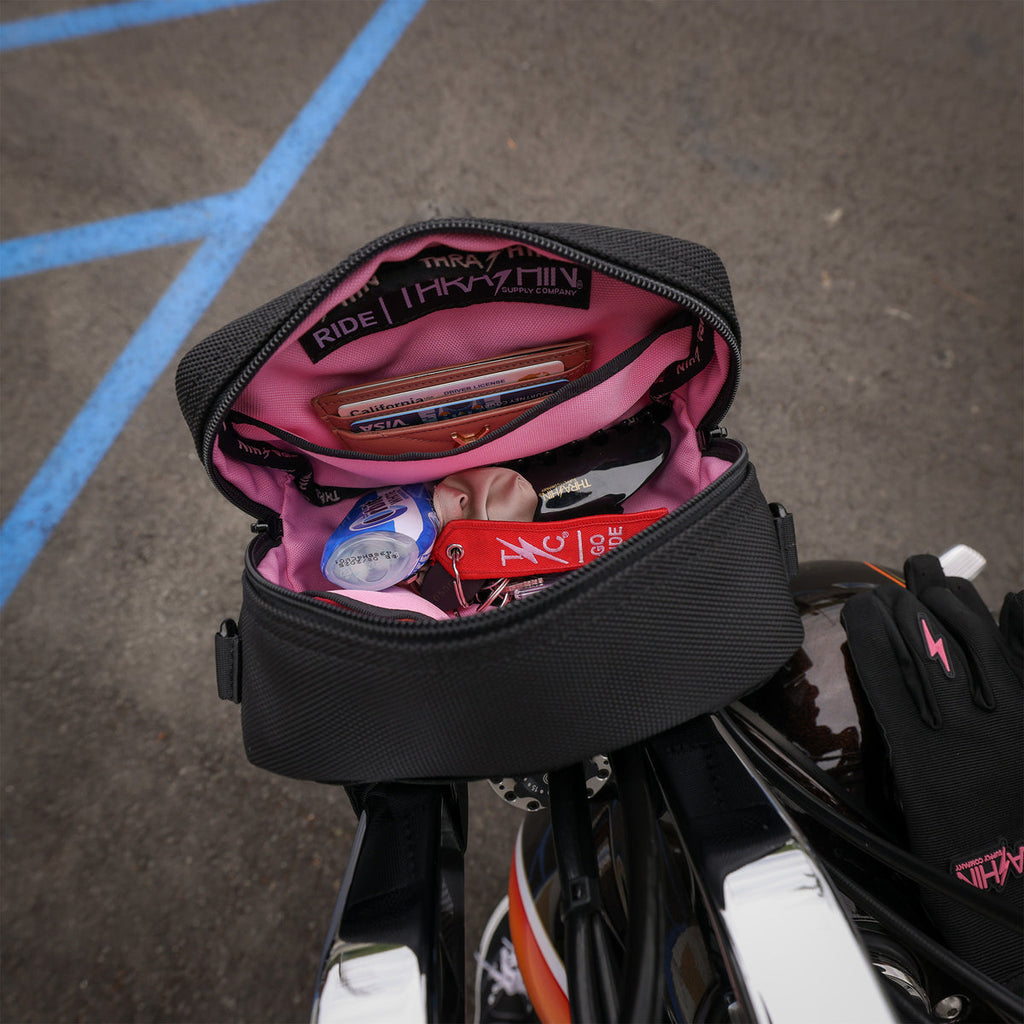 Thrashin Supply crossbody handlebar bag mounted on Harley risers