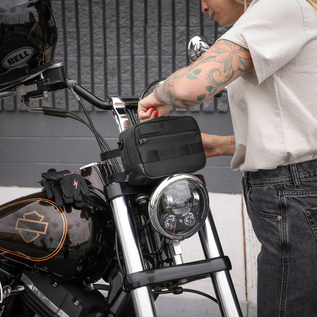 Thrashin Supply crossbody handlebar bag mounted on Harley risers