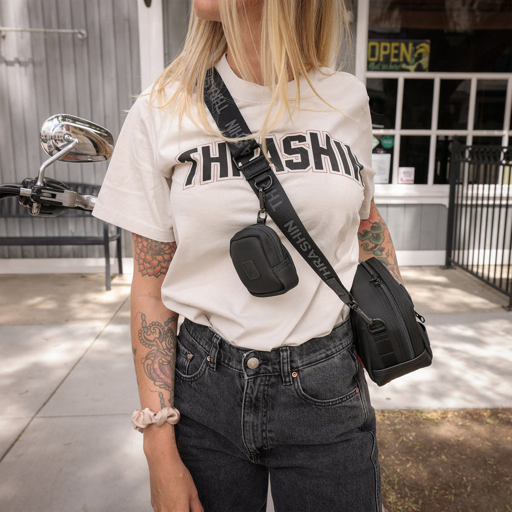Thrashin Supply crossbody handlebar bag mounted on Harley risers