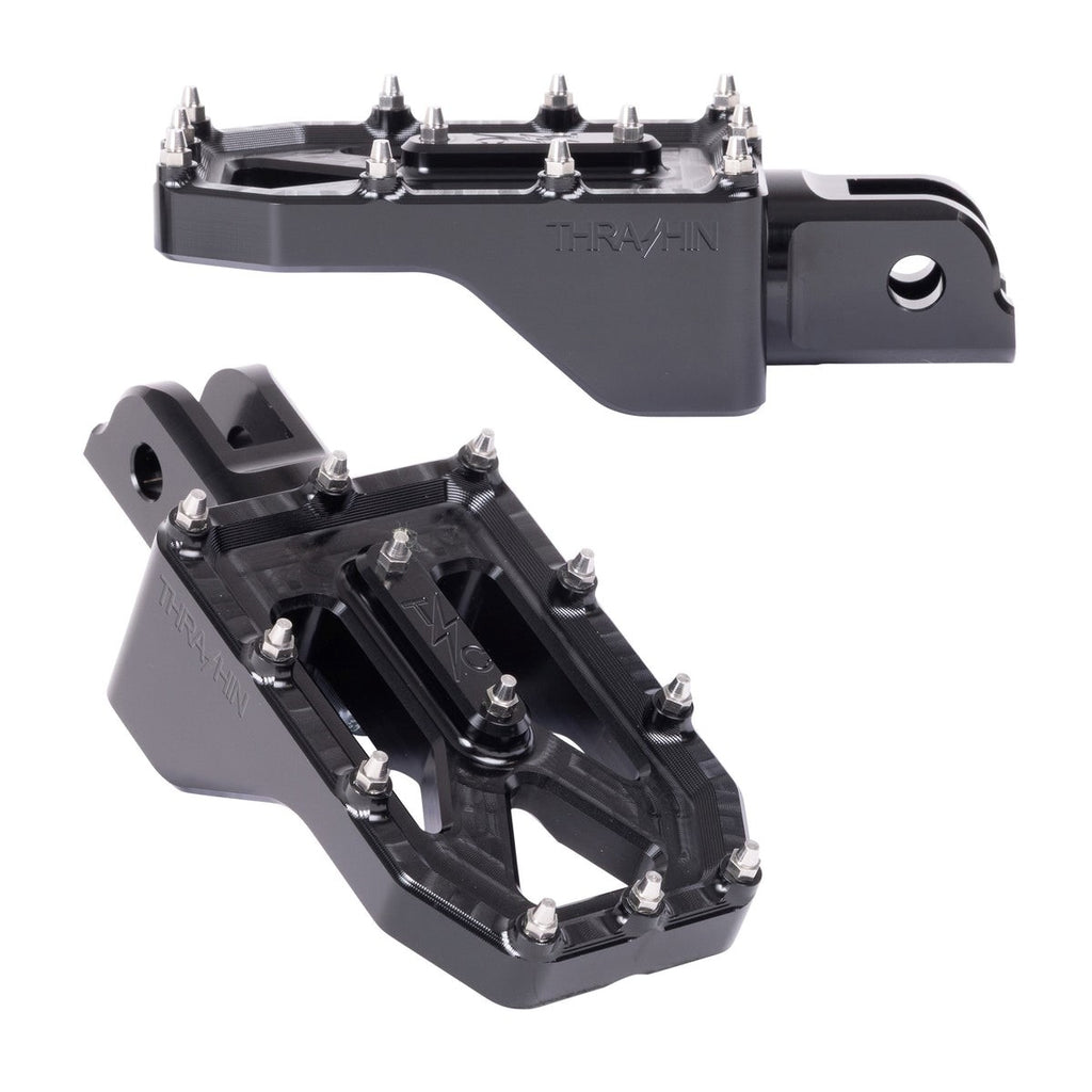 THRASHIN Supply Aggressor billet aluminum Harley footpegs for m8 softail rider